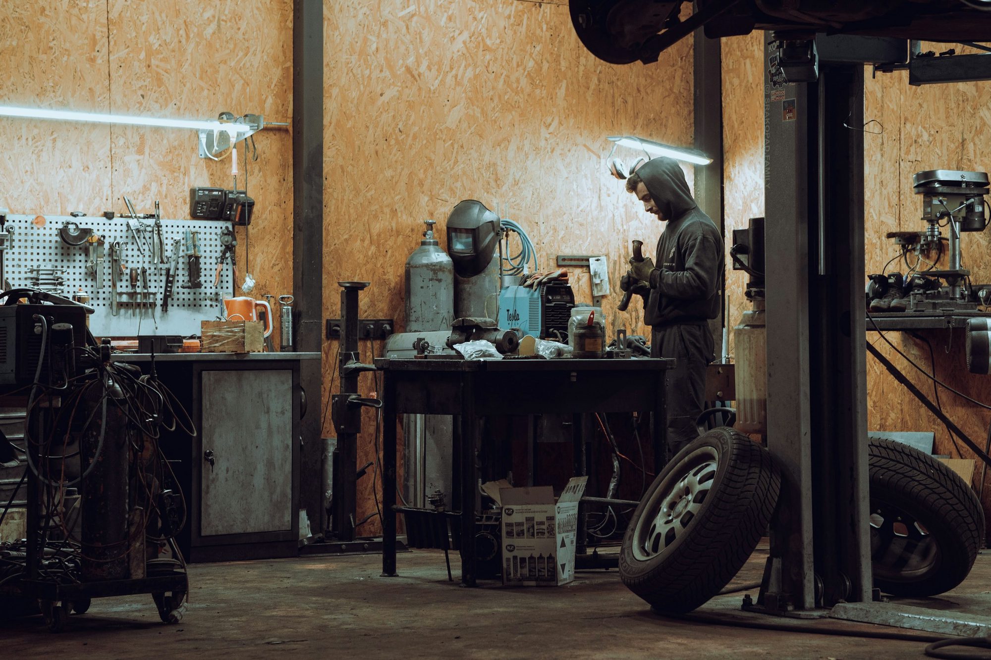 A technician at work in an automotive workshop