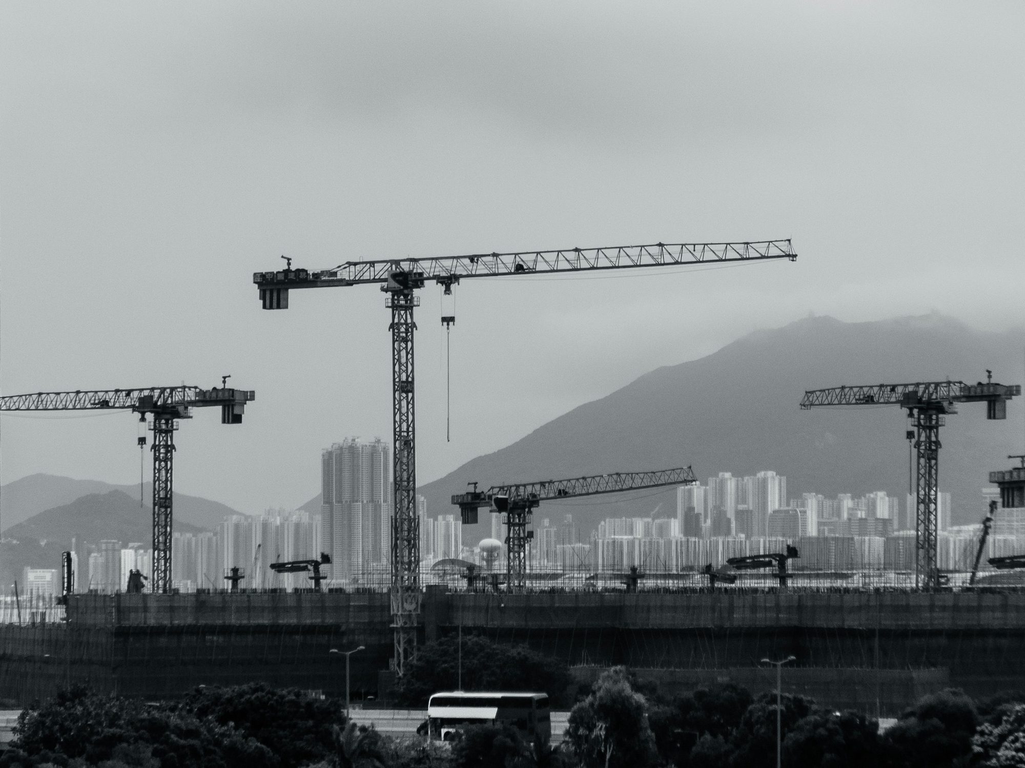 Tower cranes over a building under construction